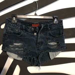 Low rise black denim distressed shorts